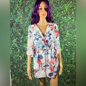 Floral print jumpsuit with long sleeves.